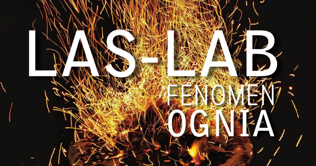 Zdjęcie iskrzącego się ognia na czarnym tle. Po środku duży napis: LAS-LAB Fenomen ognia
